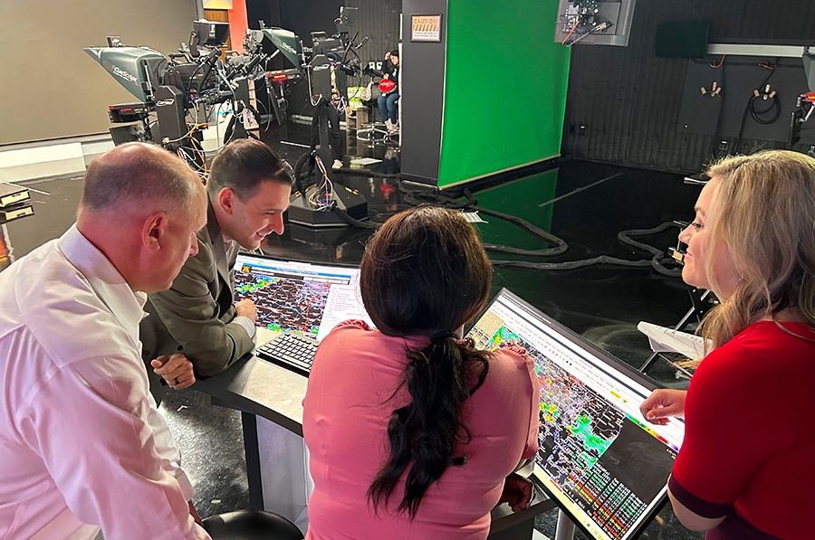 Broadcasters looking at radar data.