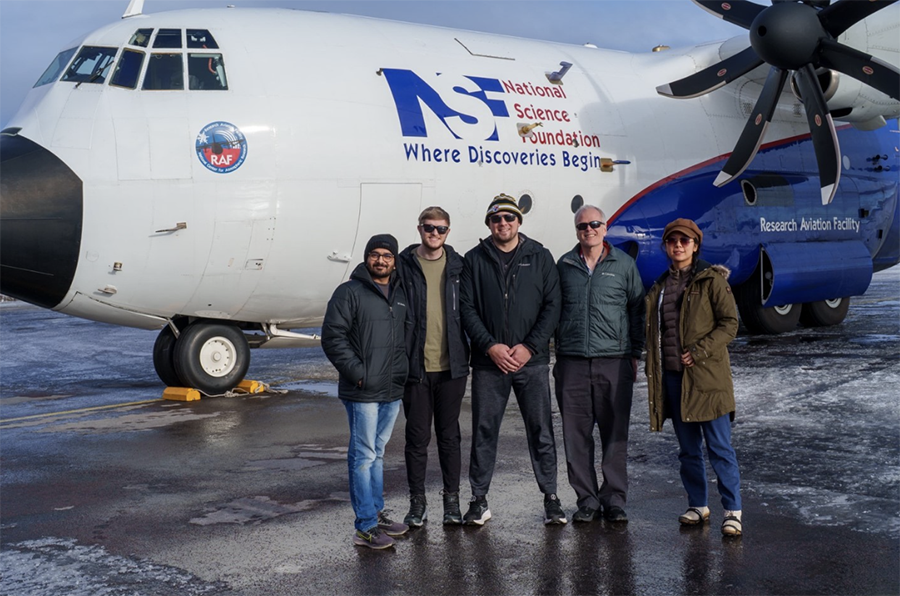Members of the OU/CIWRO Cloud Physics Group stand with their research plane.