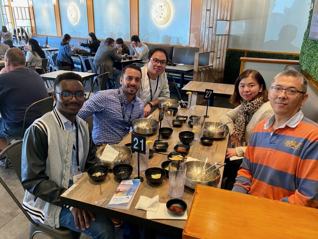 Dr. Song, and Dr. Wang getting dinner with students