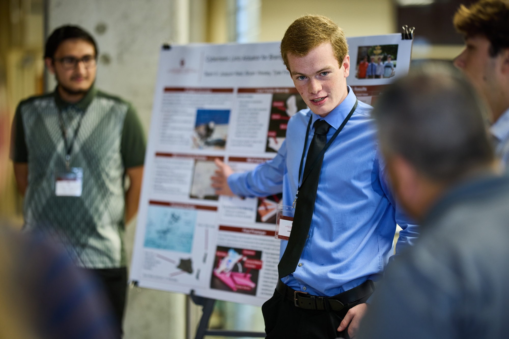 Students presenting a Capstone Poster. 