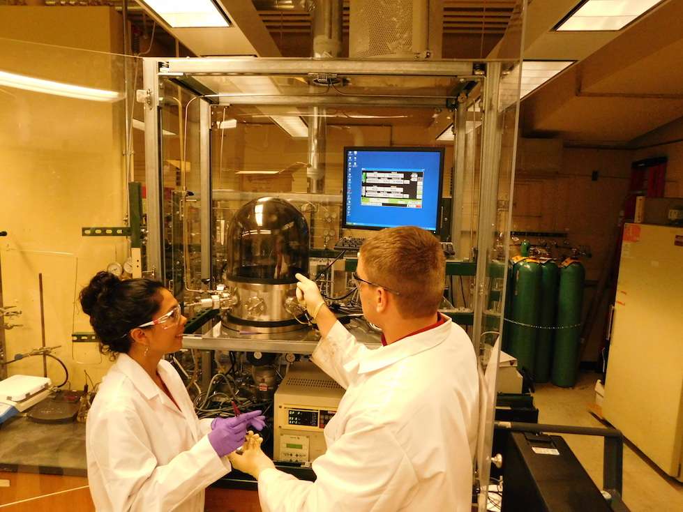 Alejandra and Lawrence in the lab