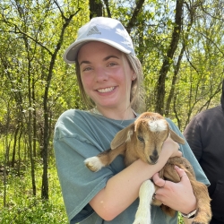 Sydney Nordquist holding goat