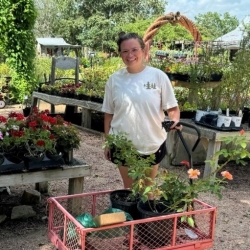 Jessica Burke Jessica Burke with a cart of plants