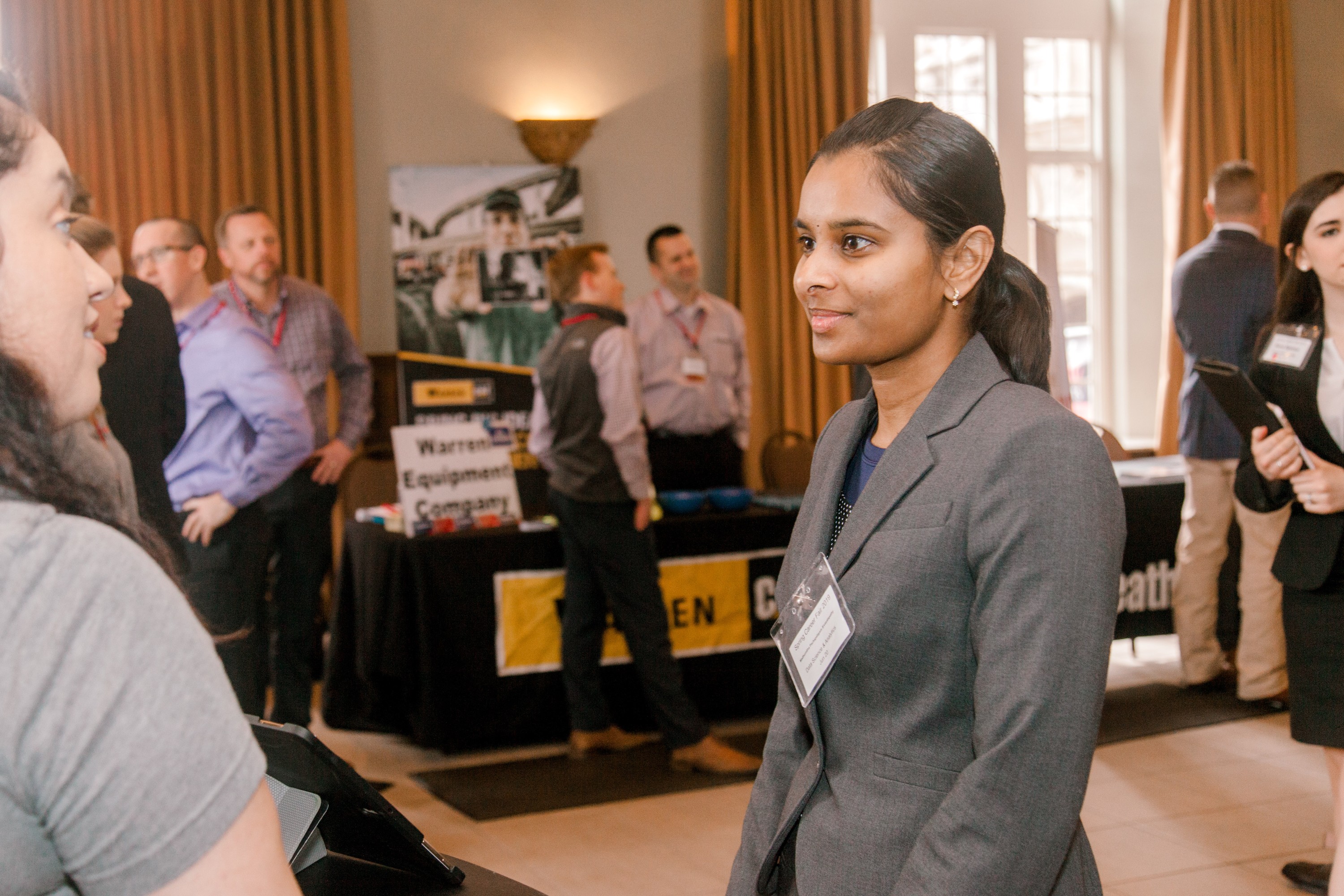 A student speaking to a recruiter at a Career Fair.
