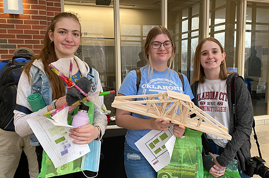 Student volunteers in the check in table for Open House