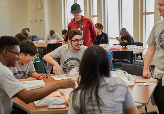 Group of High School students arriving to Devon Hall for Open house