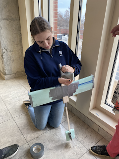 Student working on model plane