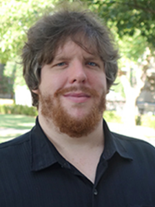 A man in a black shirt.