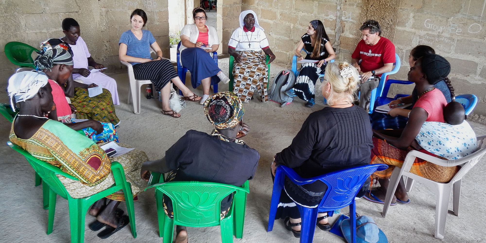 St. Monica's Girls Tailoring School, people sitting in a circle talking