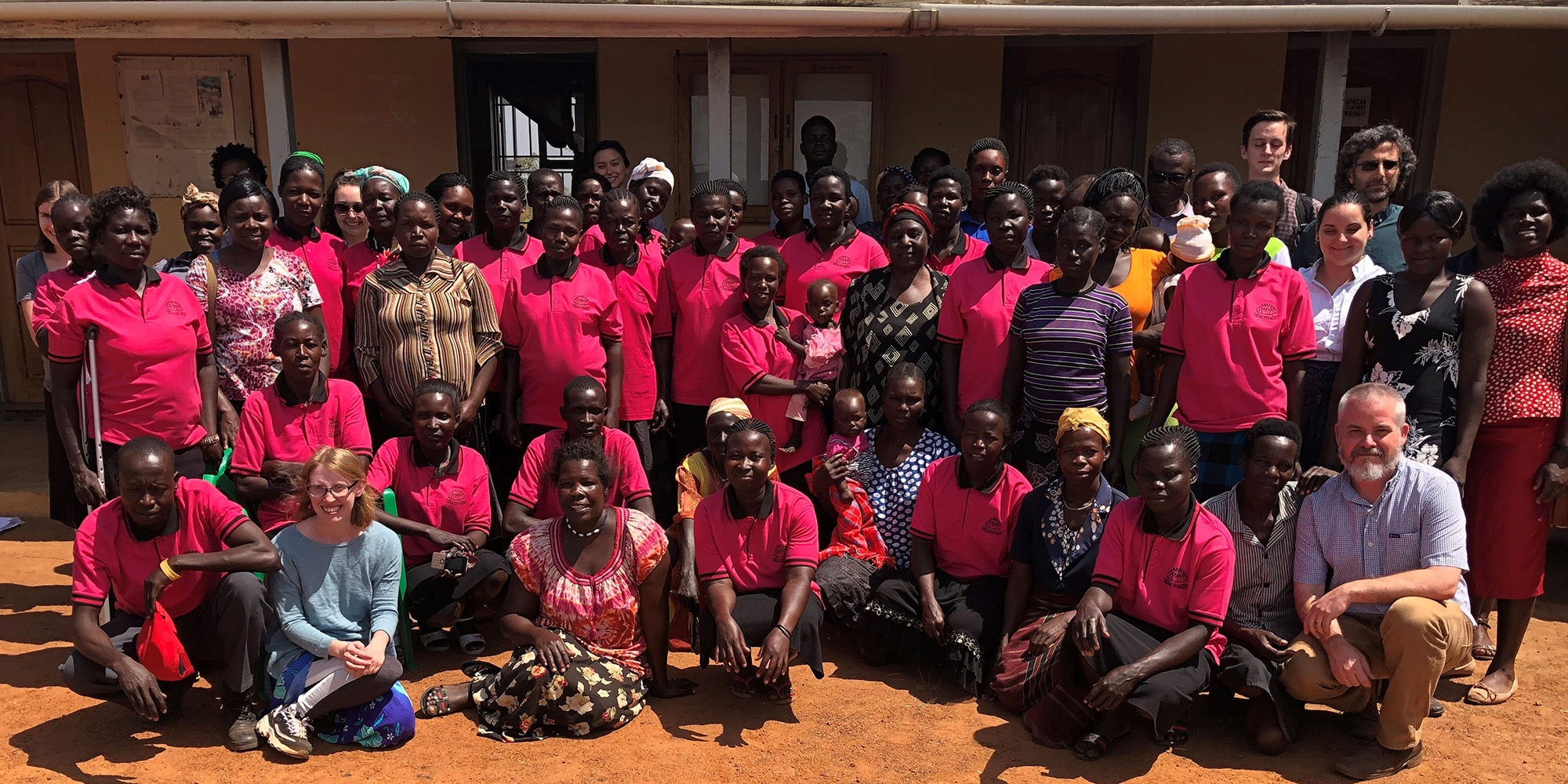 Women's Advocacy Network, people gathered outside of a building for a group photo
