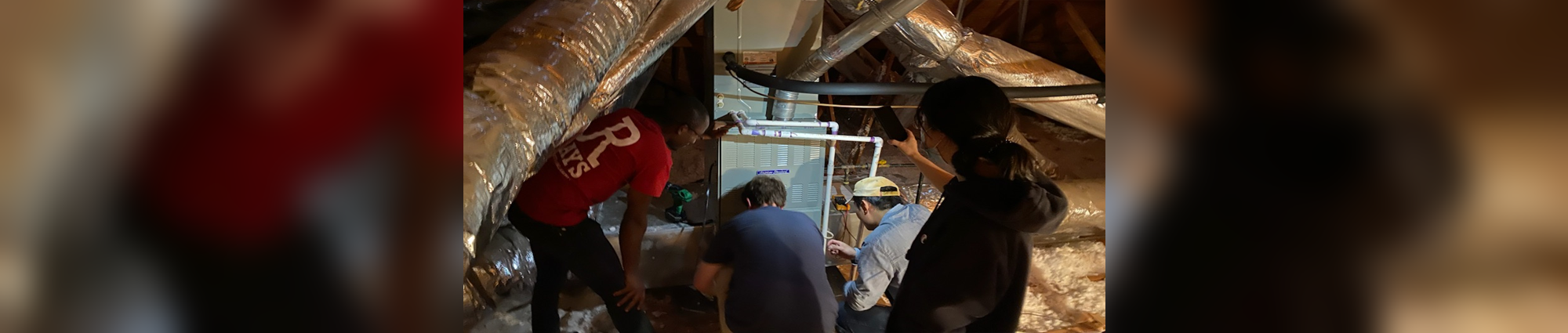 BEEL team installing smart sensors in a selected home