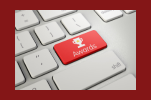 picture of a keyboard with a button that says awards