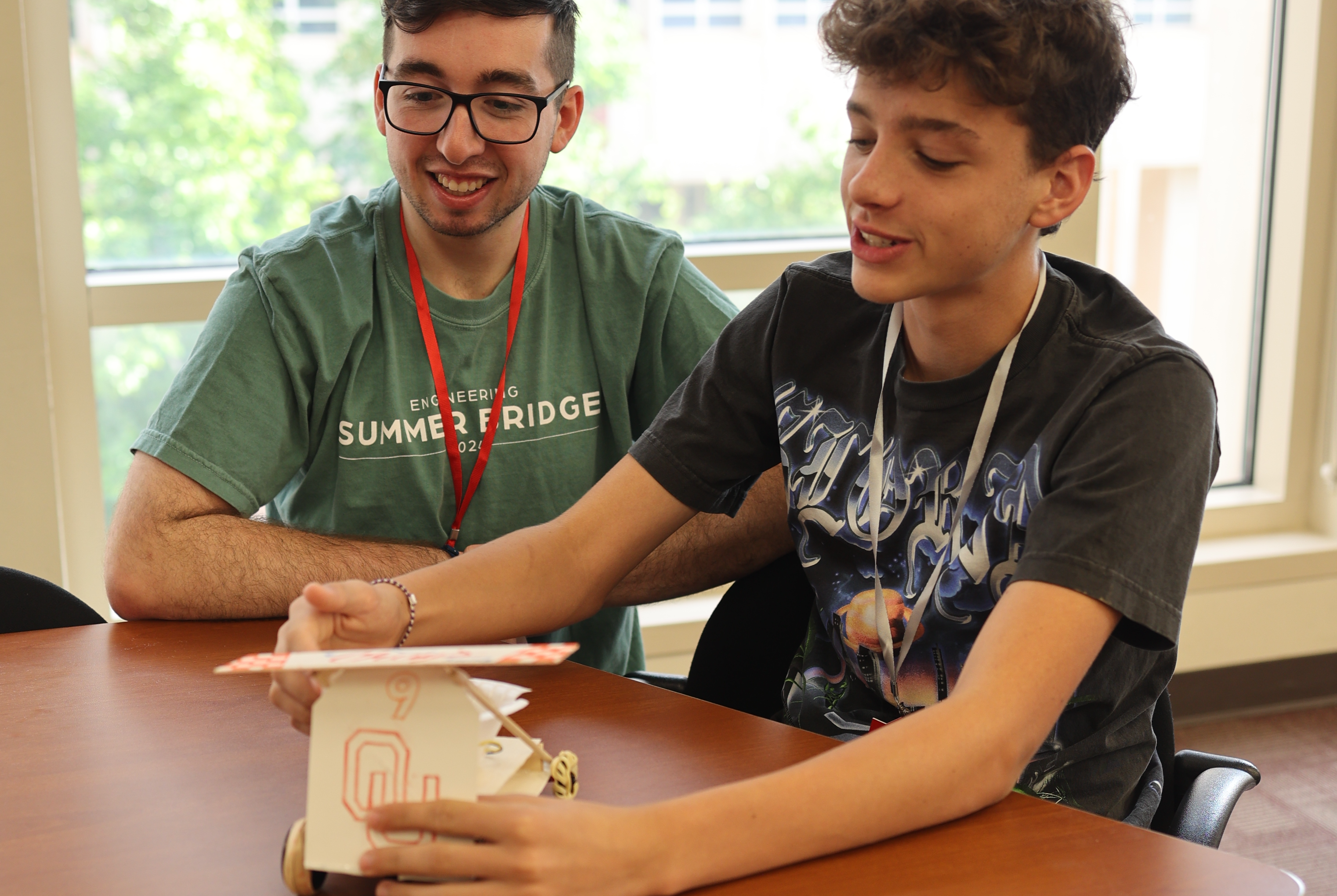 Students working on an engineering project together. 