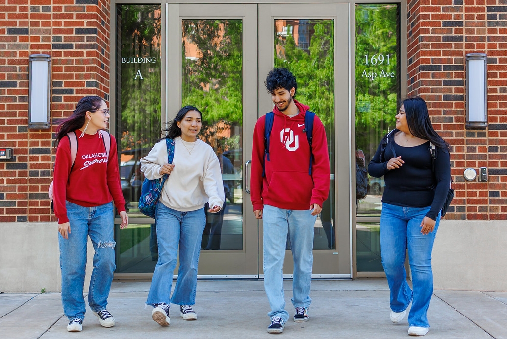 Four students walking to class together.
