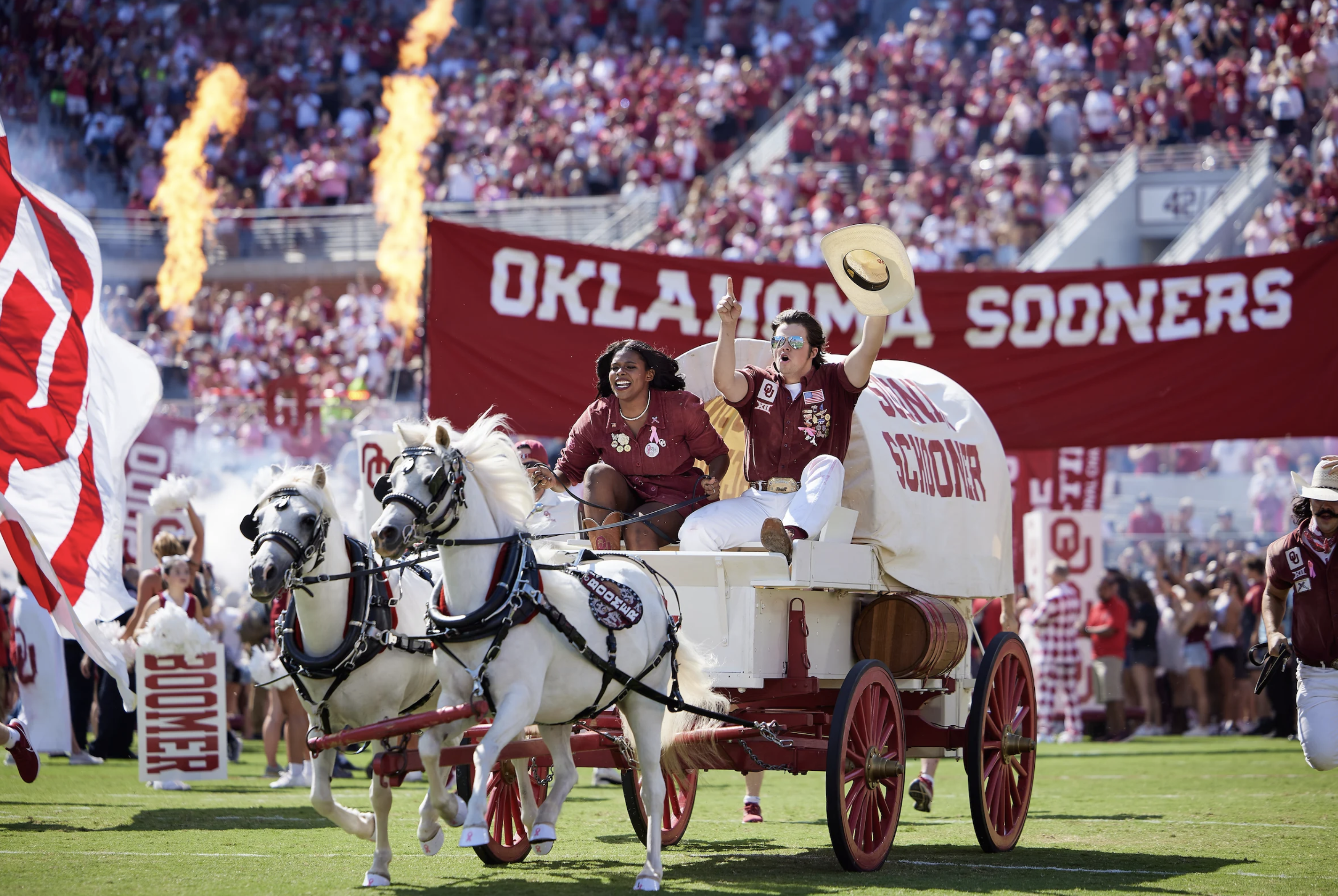 OU students riding the Schooner on the footbell field.