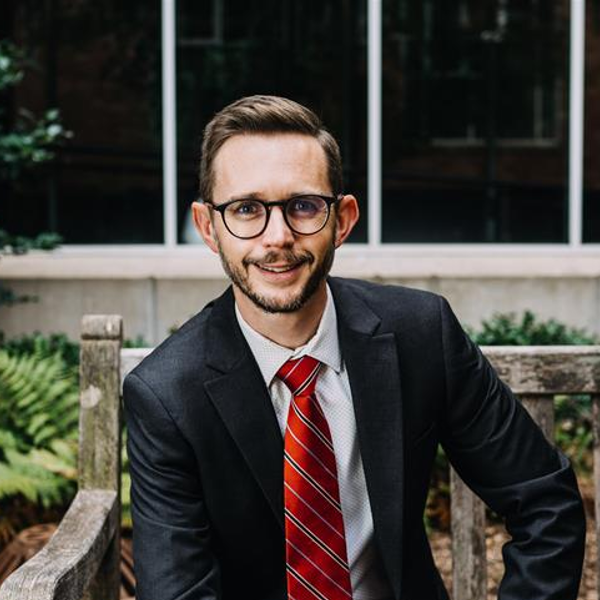 Headshot photo of Dr. Christopher Baumgartner