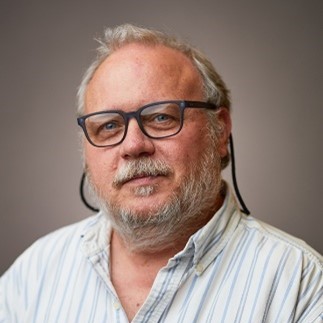 Headshot photo of Dr. Ralph Beliveau