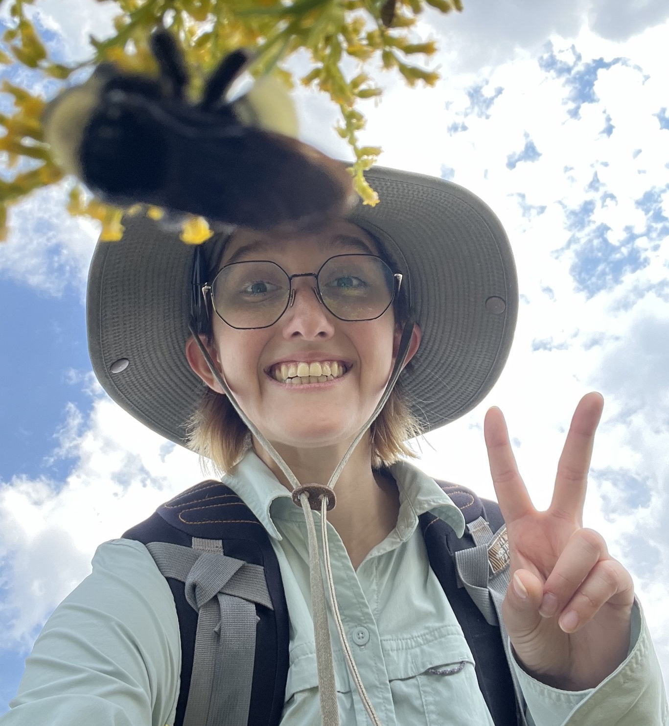 Photo of Izzy and a bee