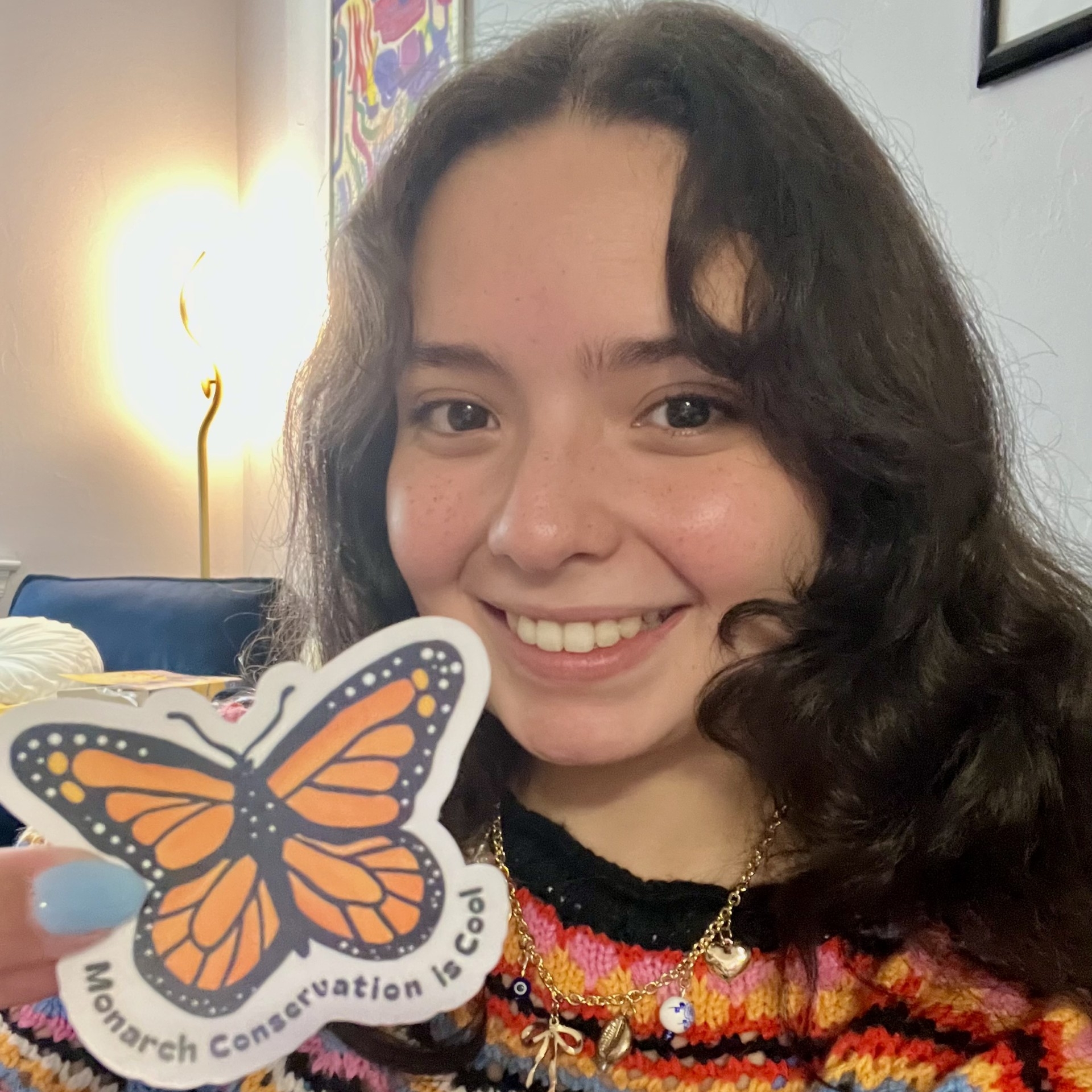 Illiyana with a sel-made Monarch Butterfly sticker