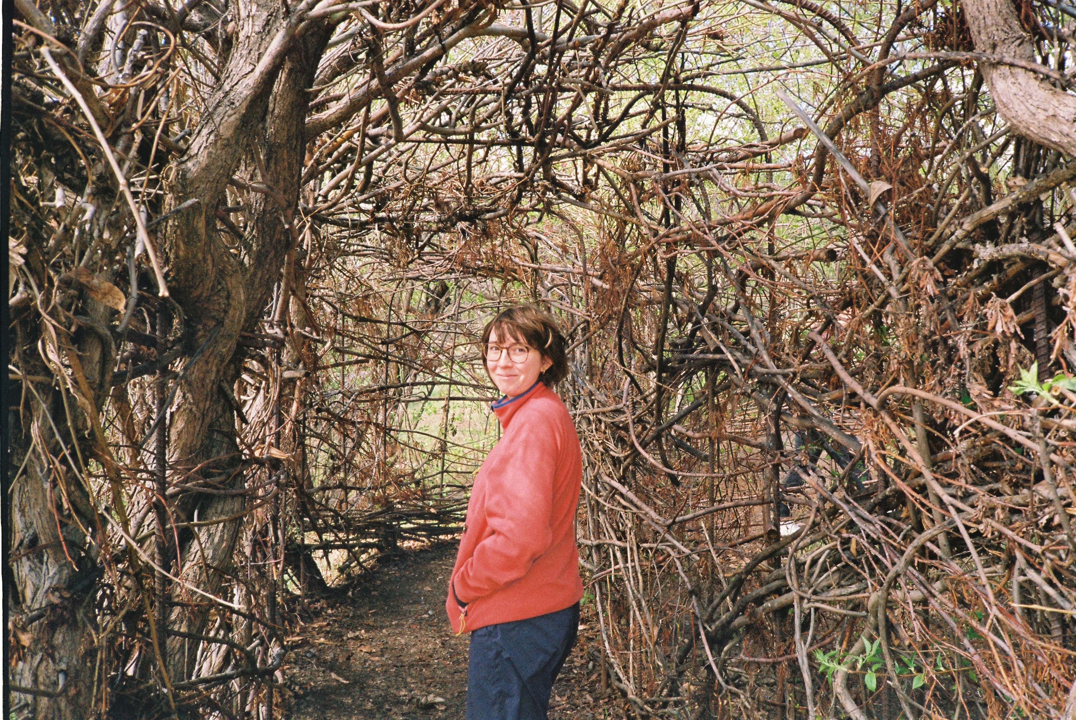 Katelynn in a tree tunnel