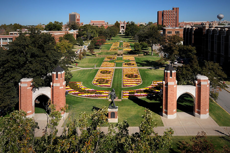 A view of the South Oval with fall flowers in bloom.