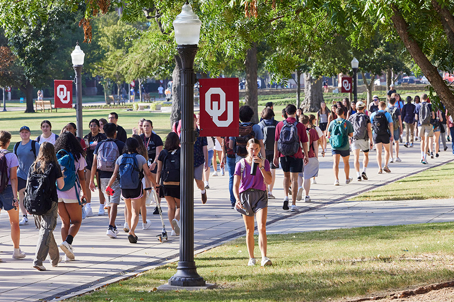 Students walking on the O U campus.