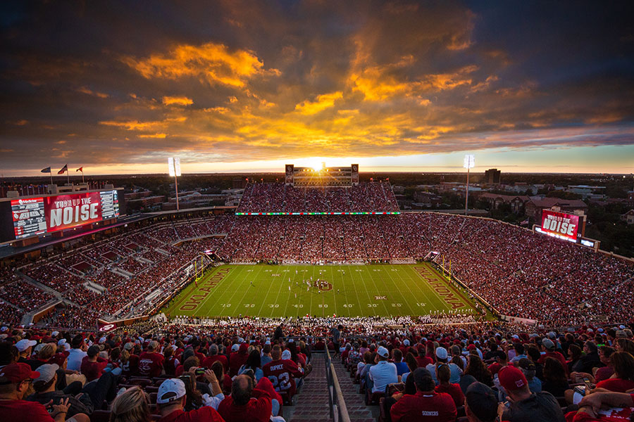 Football stadium with sunset in the background