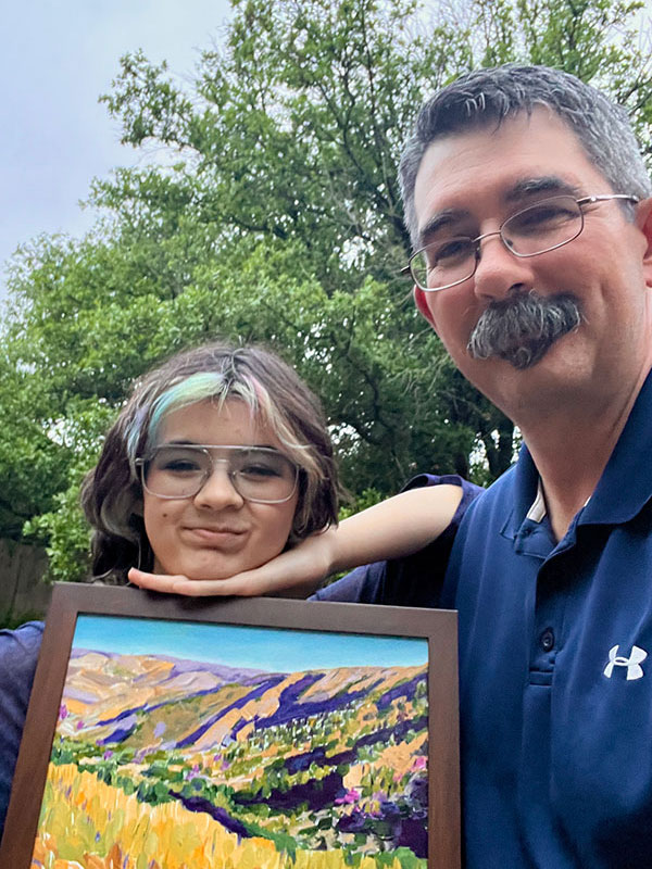 Dr. Harris and Sophie with their Art of the Walls Gala piece by Jim Vernun.