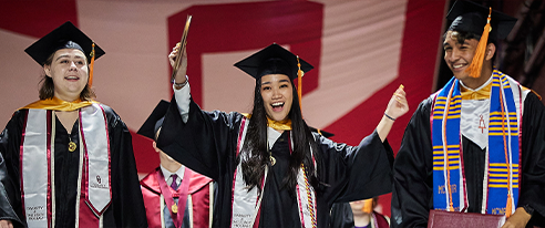 Three Students at Graduation 