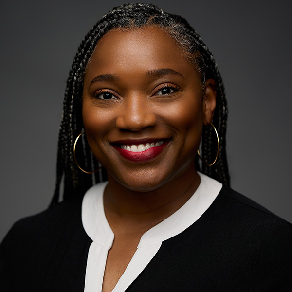Deveda Mason in a black and white blouse