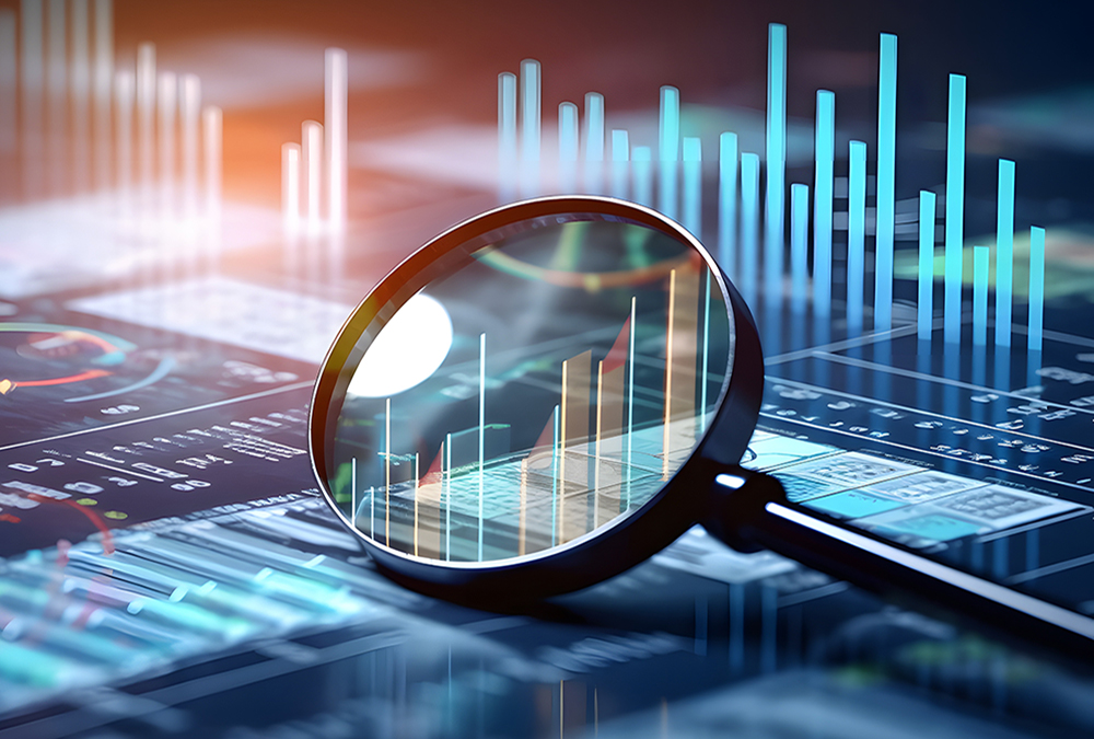 magnifying glass looking at 3D graphs and research data