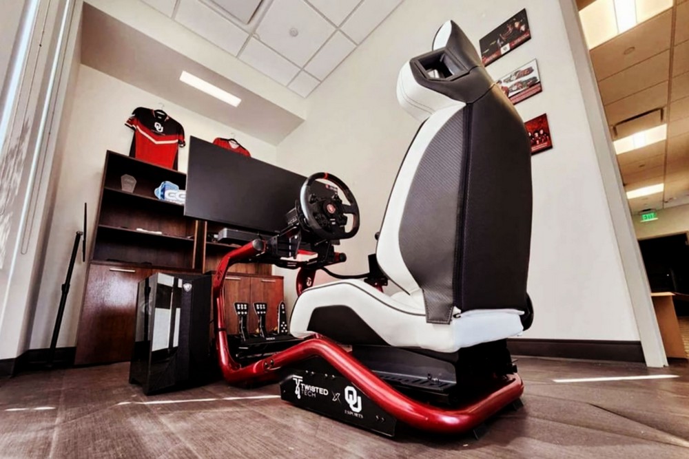 ou esports development clinic front lobby with racing rig.