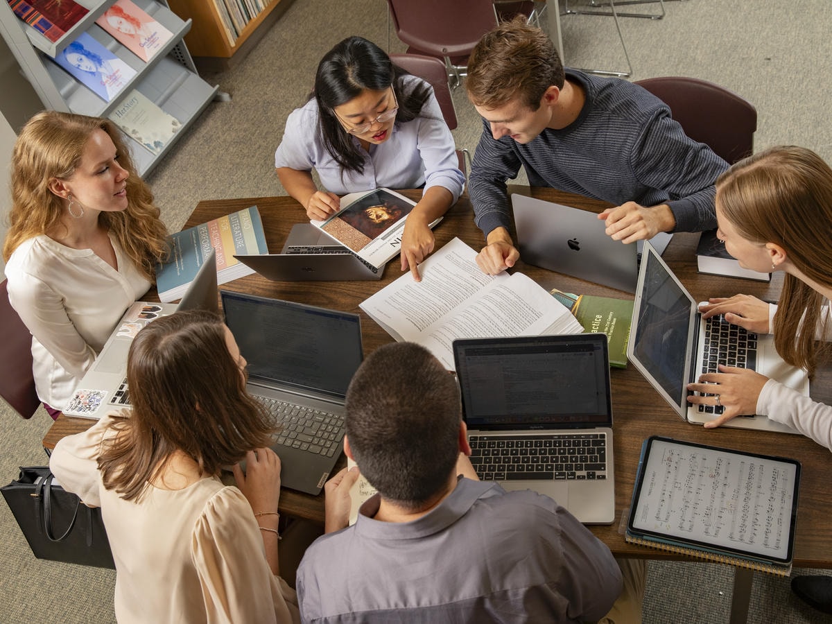 Graduate students in pedagogy resource library.