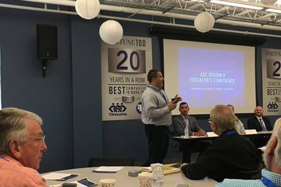 Alumni attend an event.