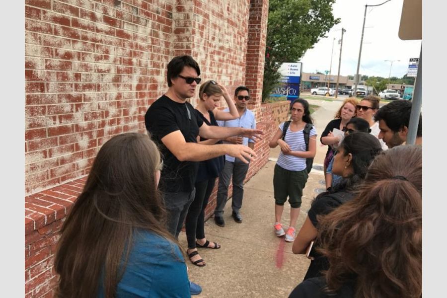 Brian Philips and Deb Katz lead students on a tour.