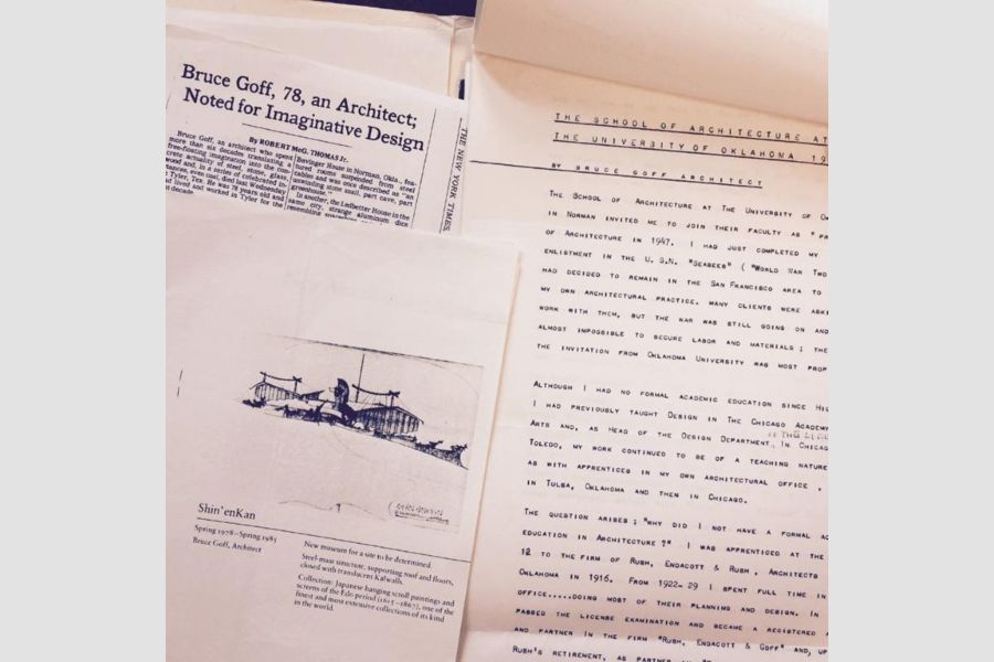 A pile of papers about The American School of Architecture.