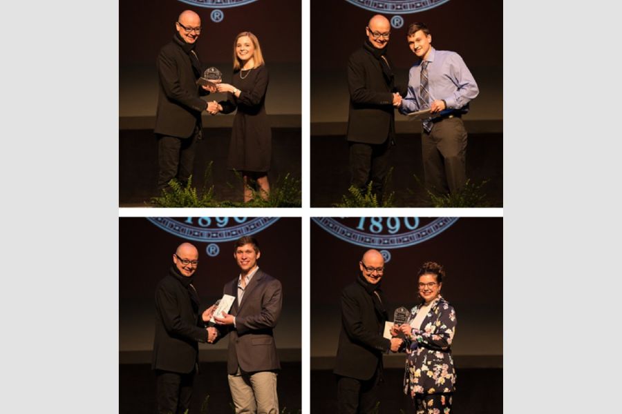 Dean Hans Butzer with each of the four award recipients.