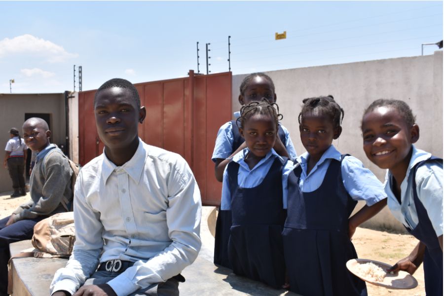 Picture of some students from Chainda, the O U designed primary school.