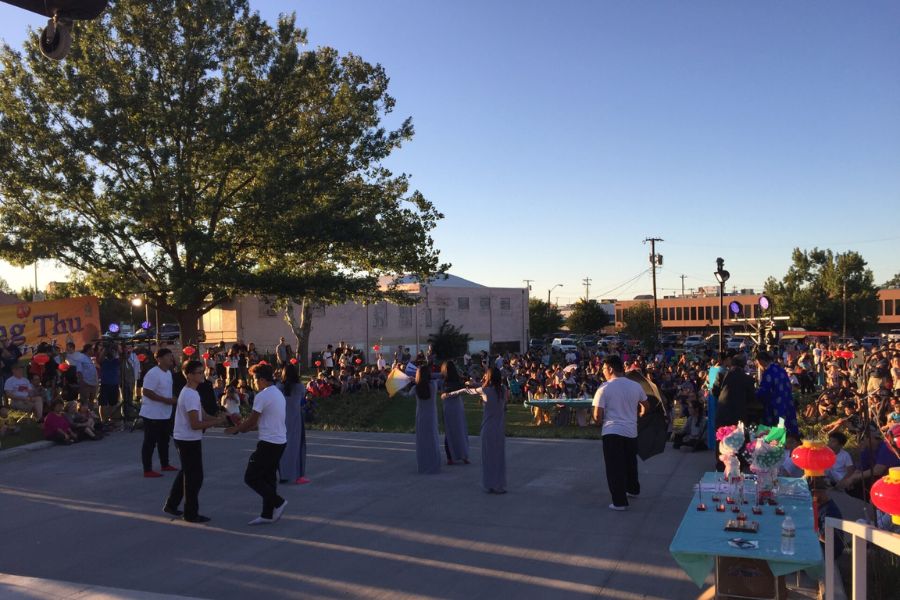 People using a military park in the evening with the sun setting