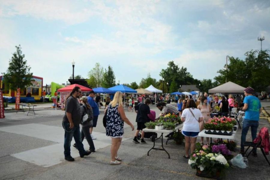 Picture of community event with pop up tents at Charley Young Park.