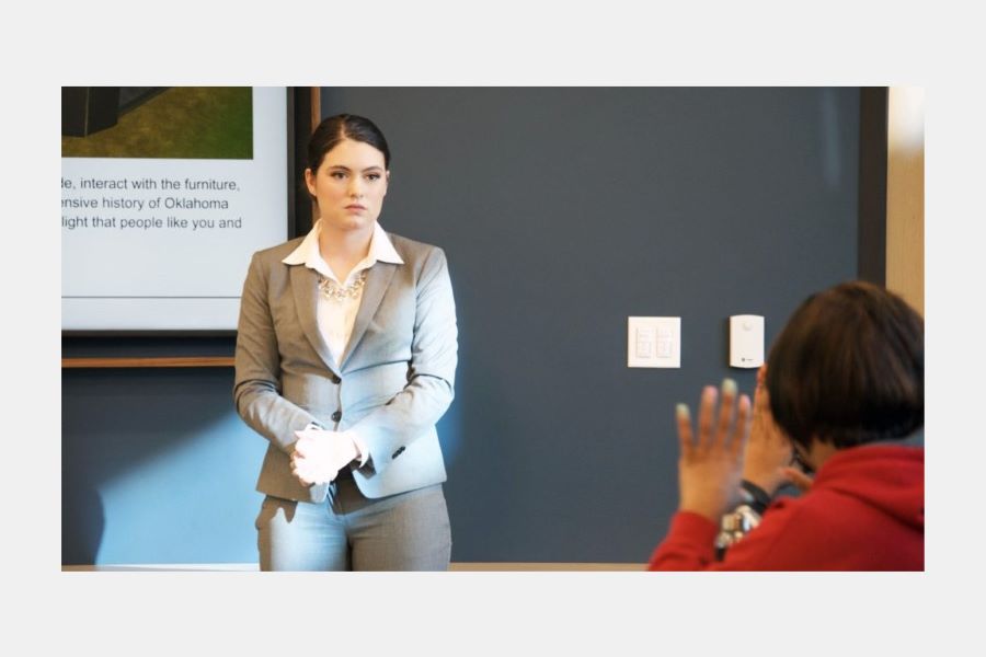 A student presenting their final project.