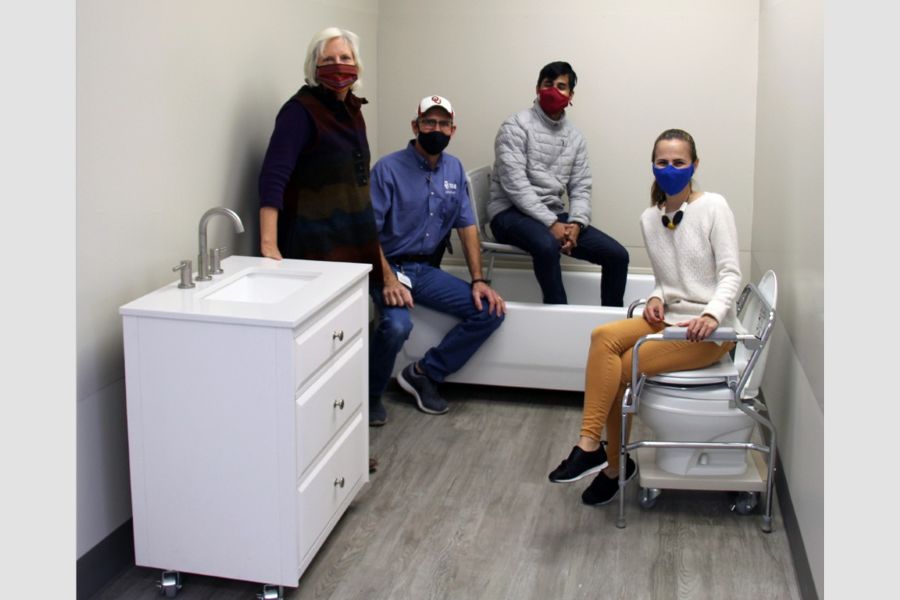 Urban Design students with movable bathroom fixtures.