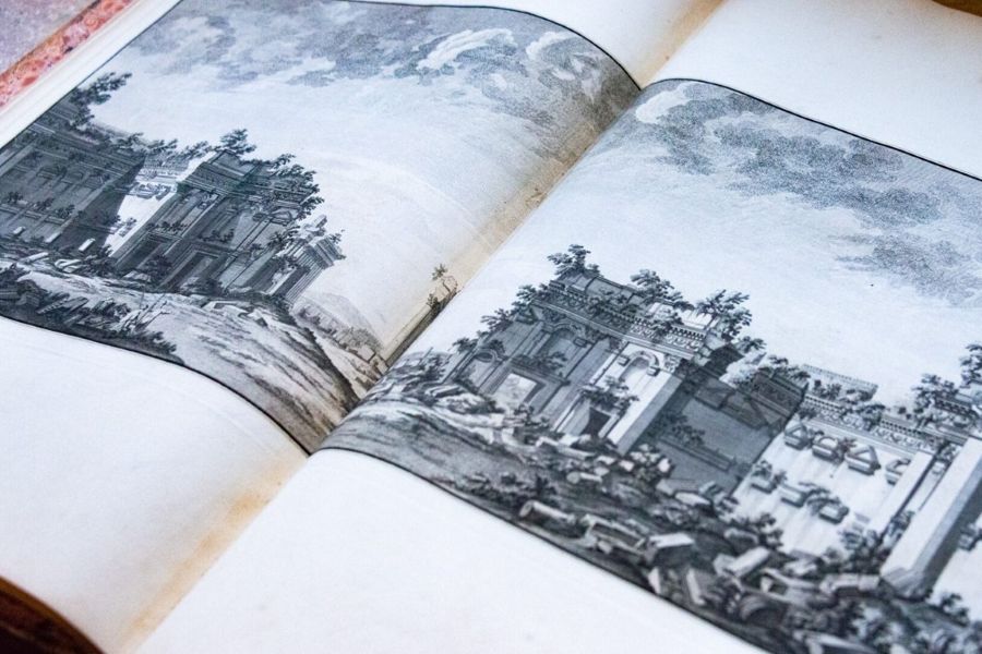 A two-page architectural illustration in an old book.