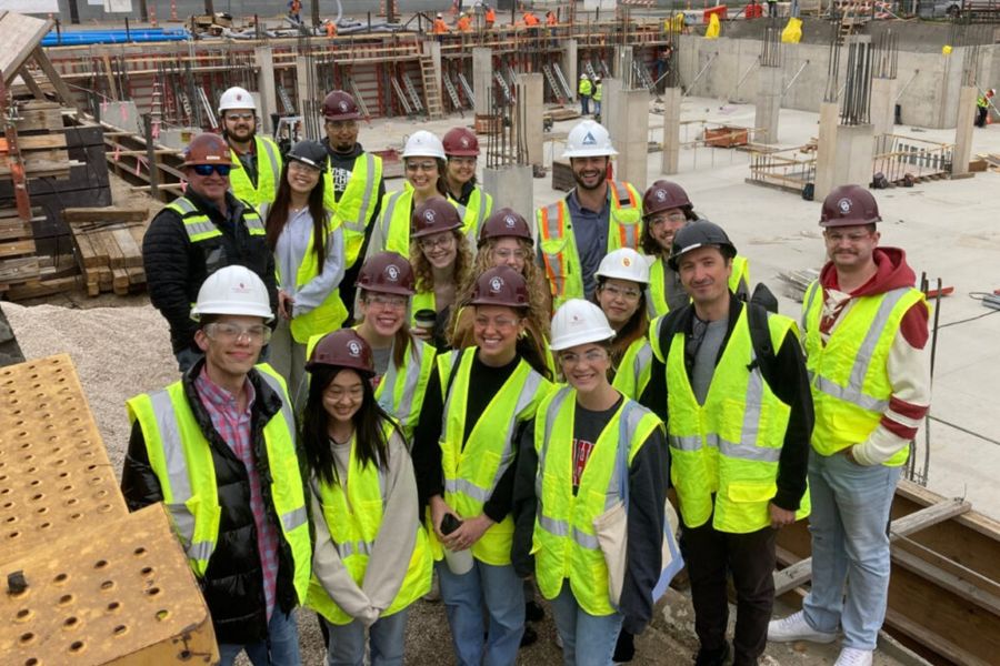 Students at a construction site.