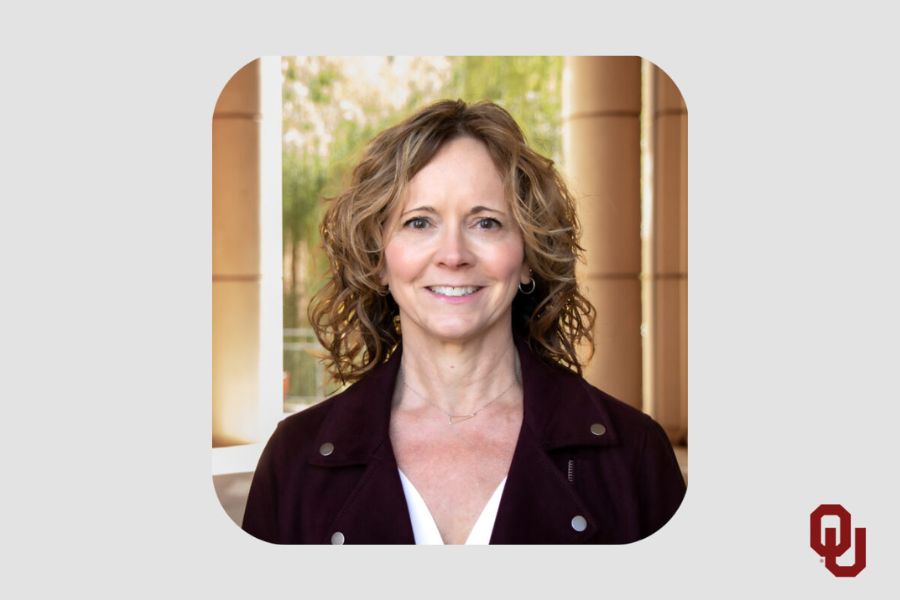 Tammy McCuen with O U logo. 