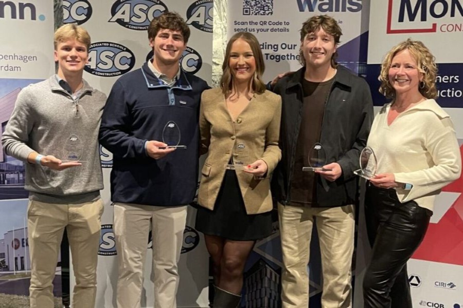 Brody Adams, Kade Berryman, Ella Blevins, Jared Schenk, and Dr. Tammy McCuen with trophies.