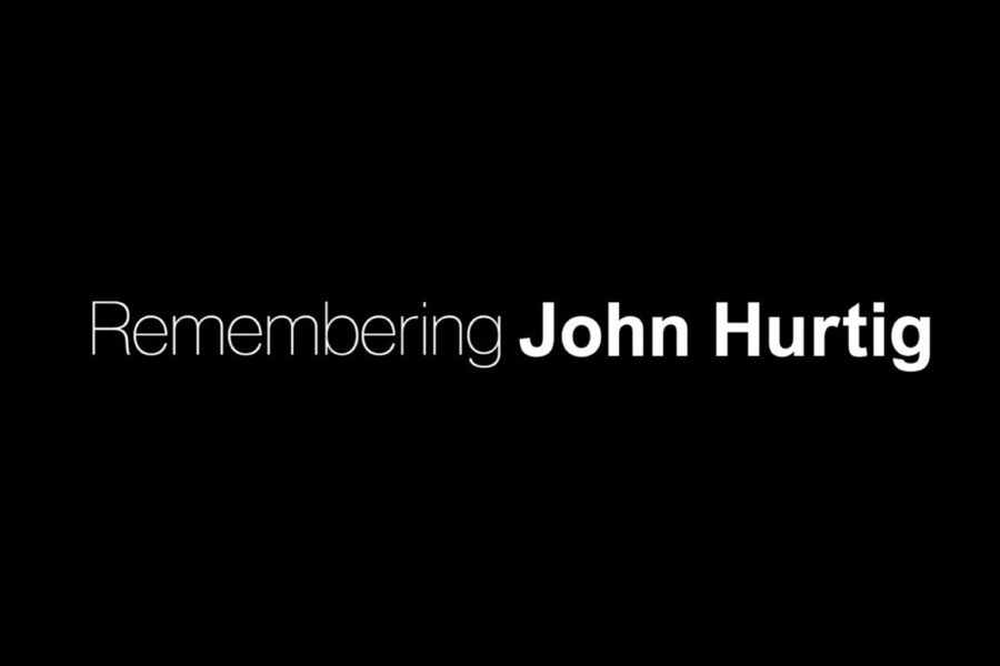 A black background with the text "Remembering John Hurtig".