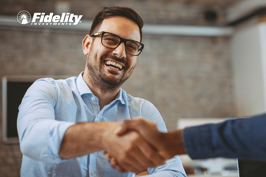 Fidelity financial advisor shaking a customer's hand with a Fidelity logo watermark in the top left corner.