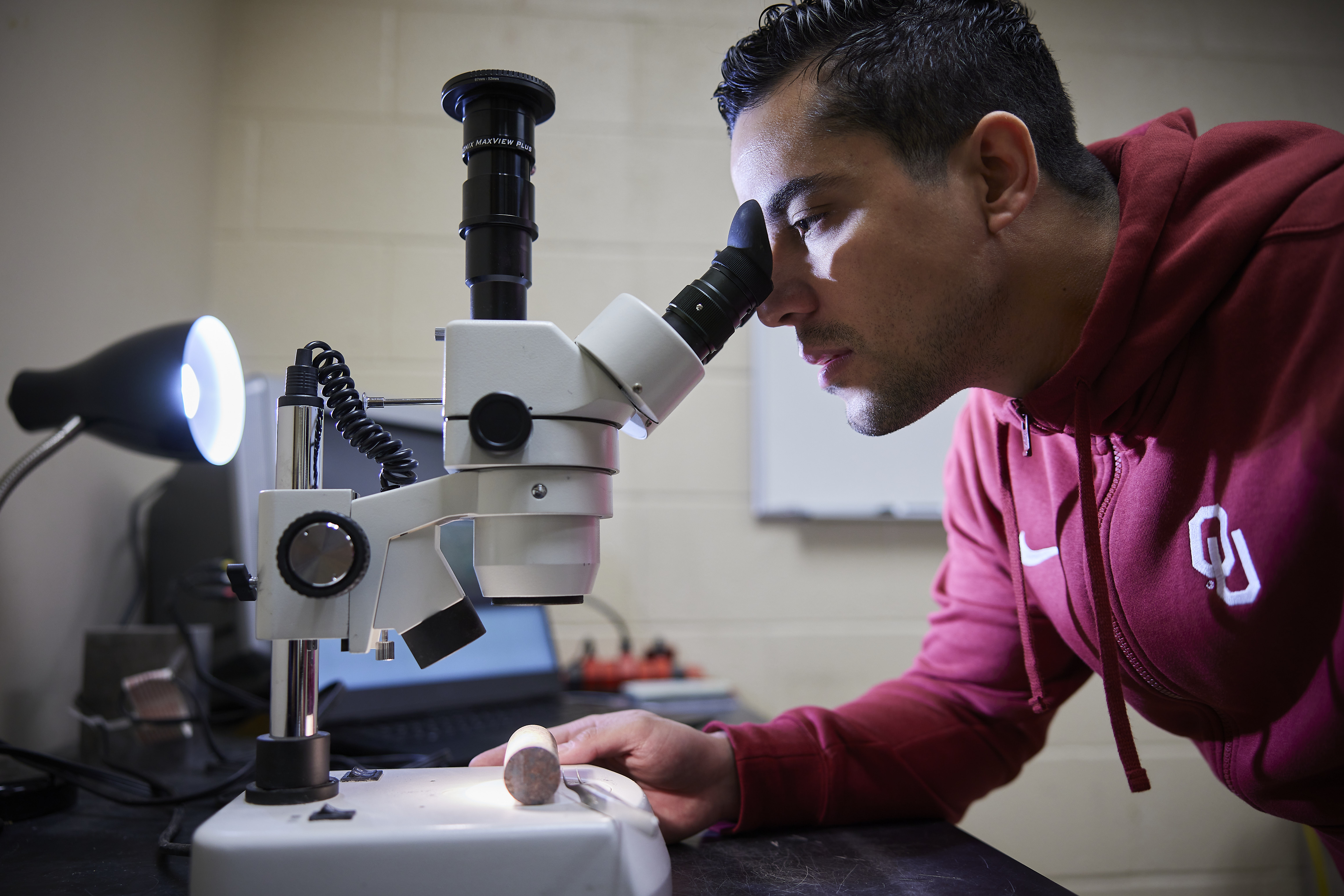 Student conducting research in a lab.