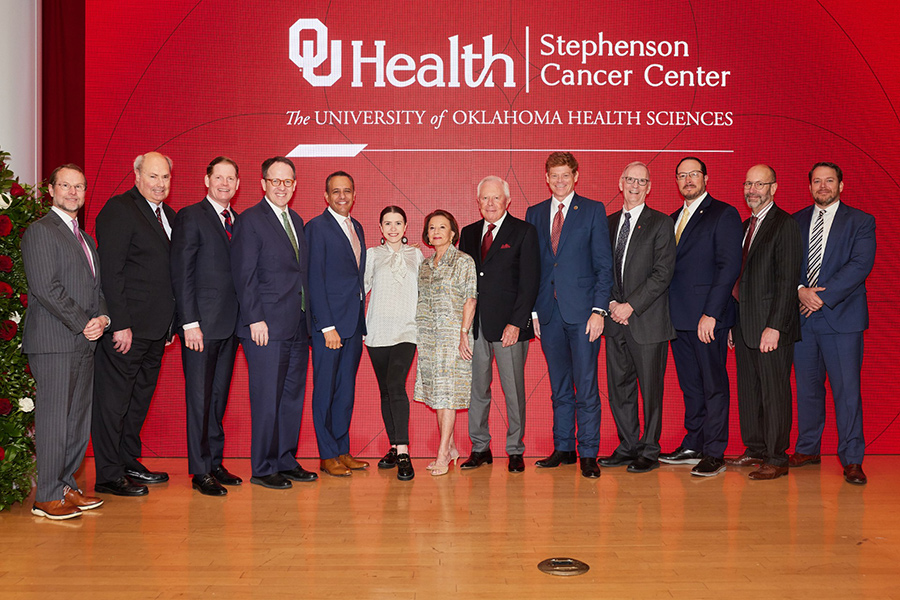 A group of people gather for the opening of the OU Health Cancer Center in Tulsa.